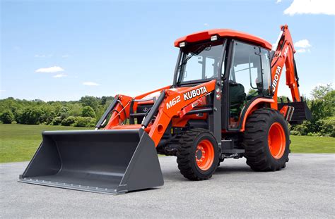 mini excavator vs tractor backhoe|kubota m62 working.